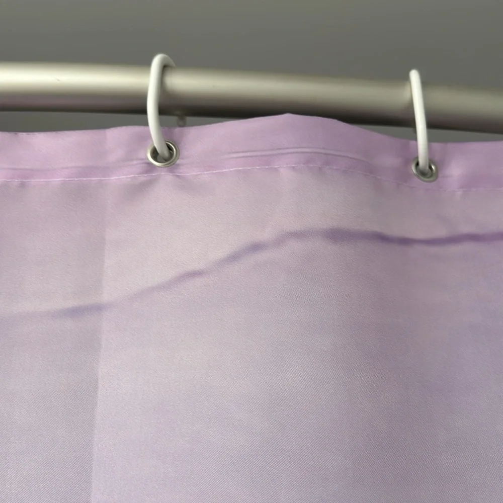 Fabric shower curtain with rings